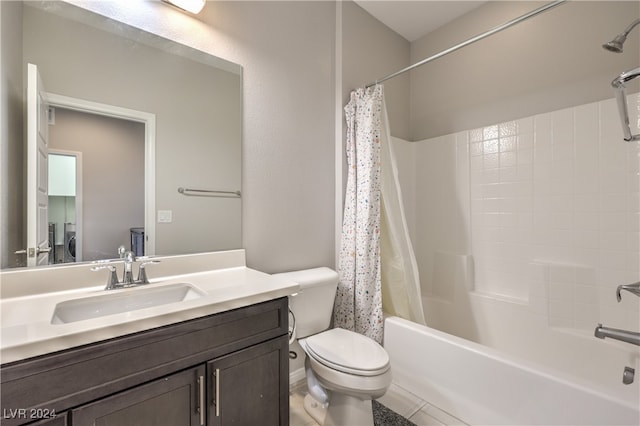 full bathroom featuring toilet, vanity, shower / bath combo, and tile patterned floors