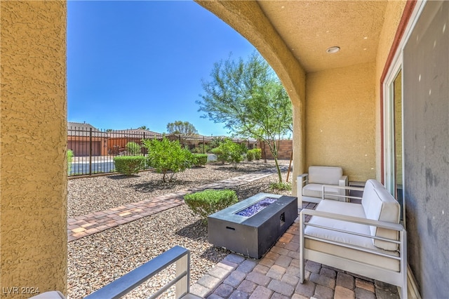 view of patio / terrace featuring a fire pit