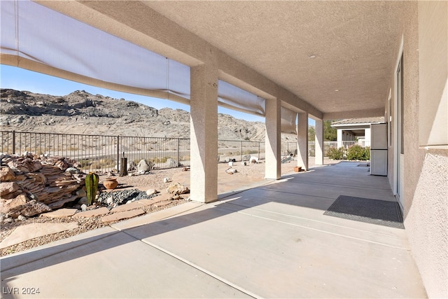 view of patio featuring a mountain view