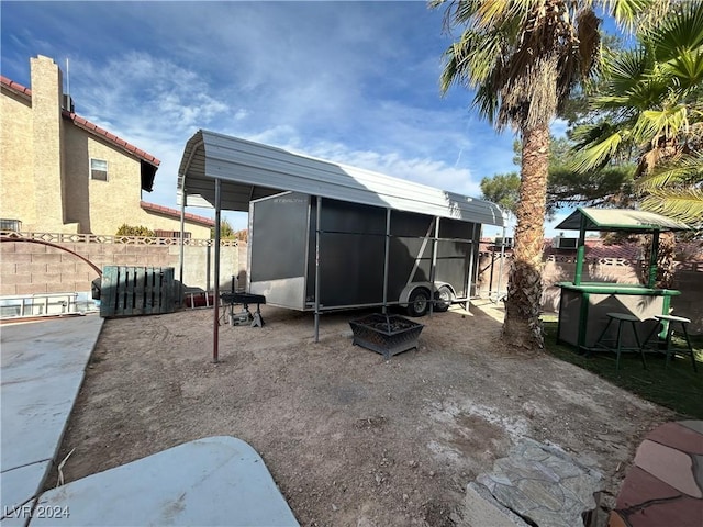 exterior space with a patio and fence