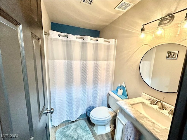 full bathroom with visible vents, toilet, vanity, and a shower with curtain