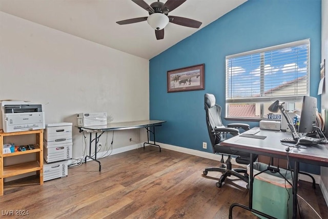 home office with baseboards, lofted ceiling, wood finished floors, and a ceiling fan