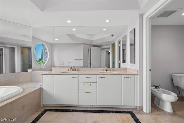 bathroom with tile patterned flooring, a bath, a tray ceiling, a bidet, and vanity