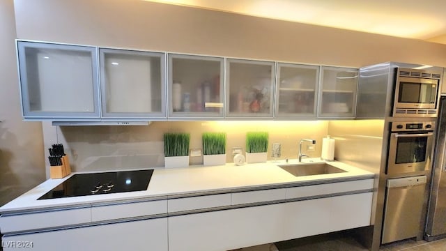 kitchen with sink and stainless steel appliances