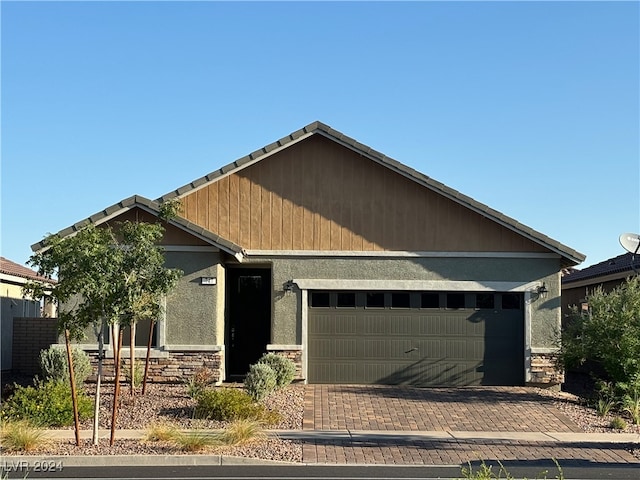 craftsman-style house featuring a garage