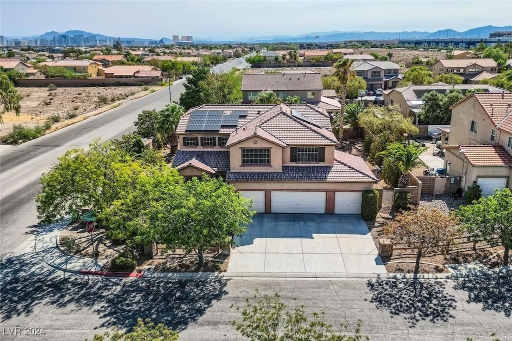 aerial view with a residential view and a mountain view