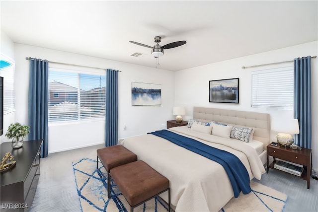 carpeted bedroom with ceiling fan