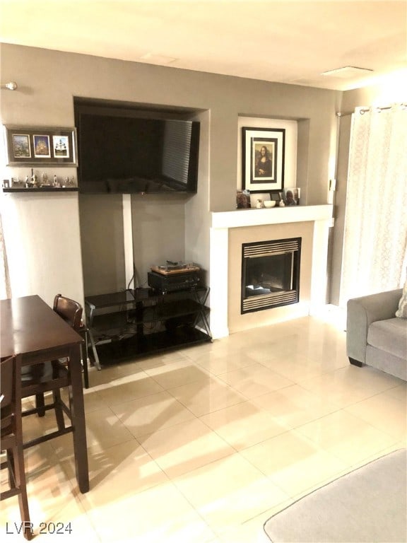 living room featuring light tile patterned floors