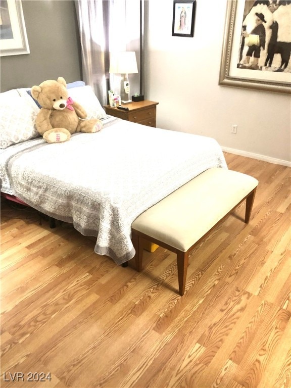 bedroom featuring light wood-type flooring