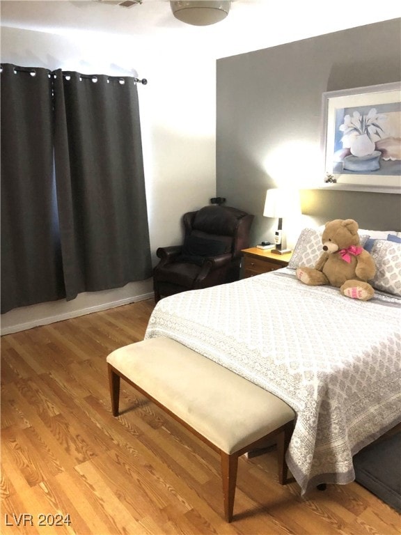 bedroom with light hardwood / wood-style floors