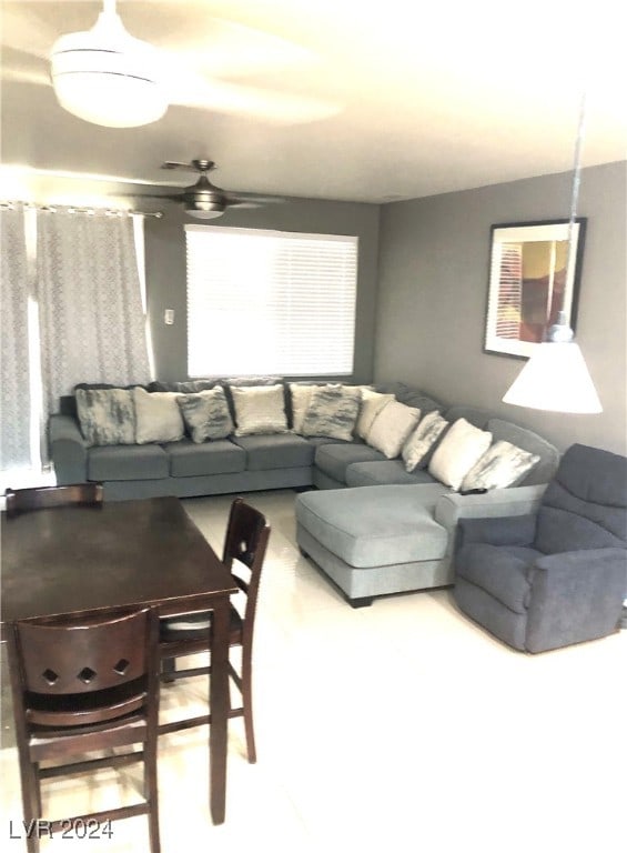 living room featuring ceiling fan