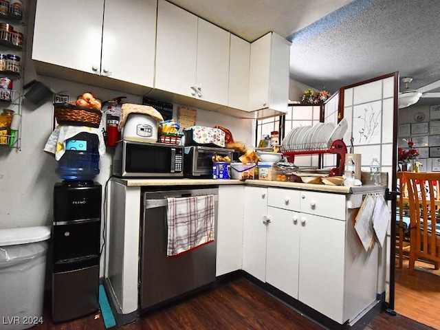 kitchen featuring white cabinets, dark hardwood / wood-style floors, and stainless steel appliances