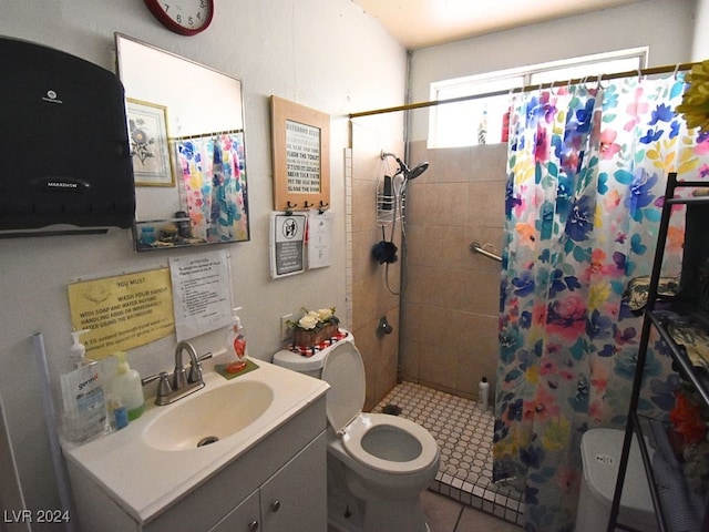 bathroom with tile patterned floors, vanity, walk in shower, and toilet