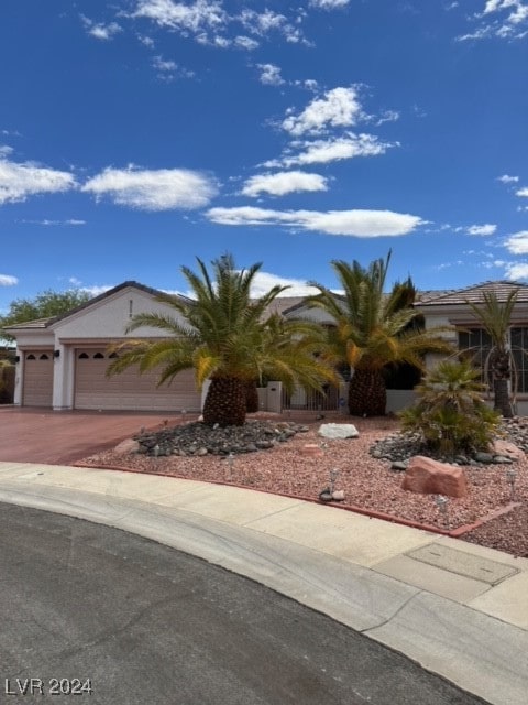 view of front of property with a garage