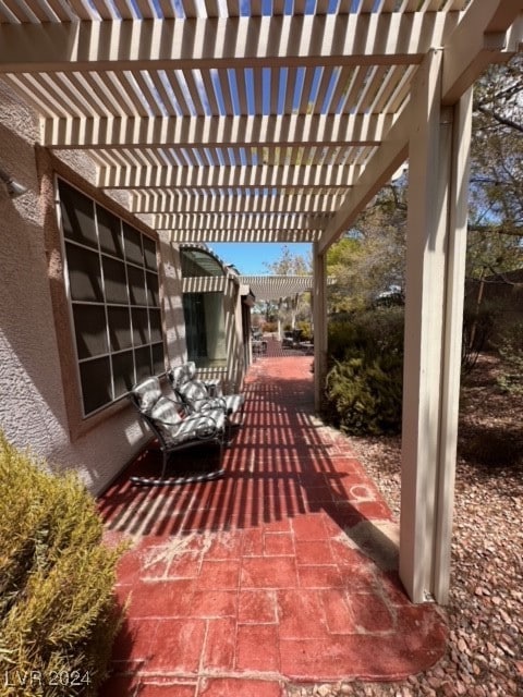 view of patio / terrace featuring a pergola