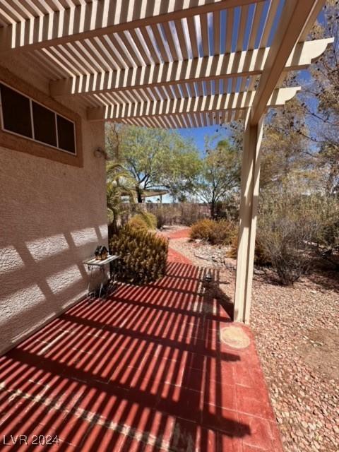 view of patio featuring a pergola