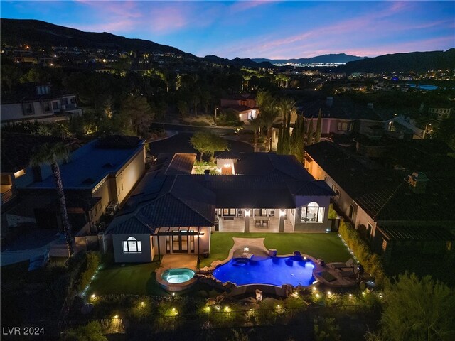 view of aerial view at dusk