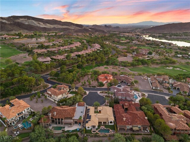 aerial view at dusk with a mountain view