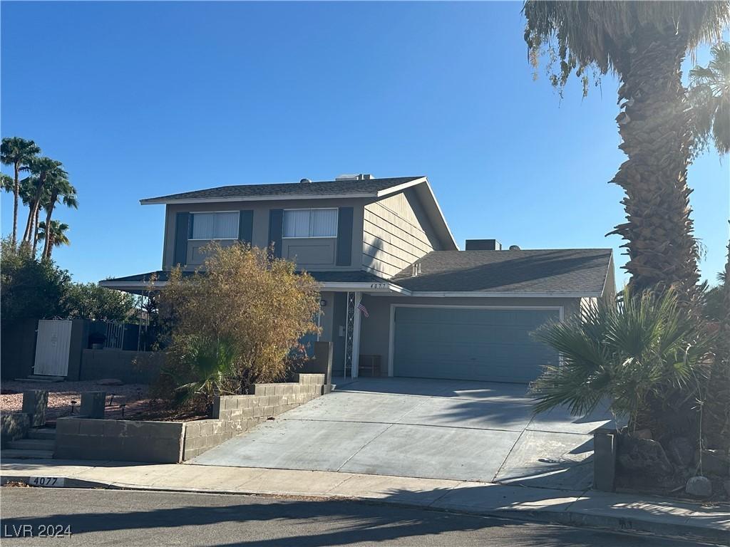 front of property with a garage