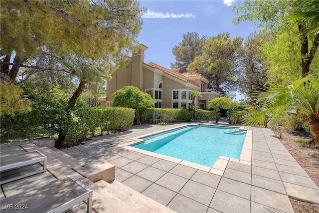 view of pool with a patio area