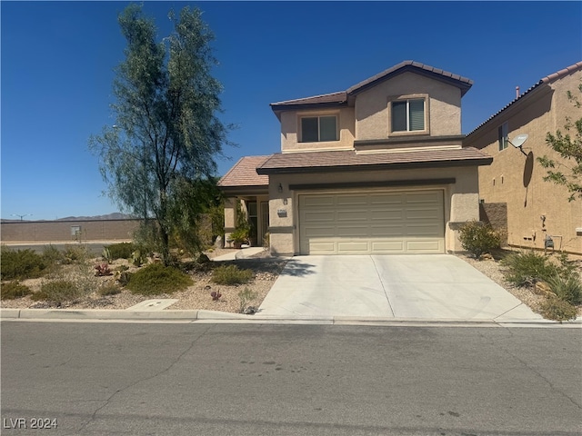 view of front of property featuring a garage