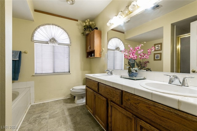 1834 Escondido Ter, Henderson, NV 89074 - full bathroom with double vanity, a healthy amount of sunlight, and a sink