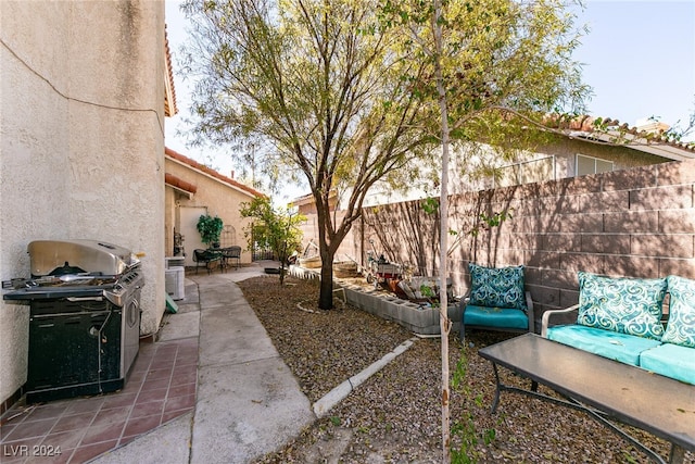 1834 Escondido Ter, Henderson, NV 89074 - view of patio with a fenced backyard and grilling area
