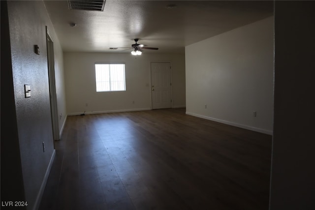 unfurnished room featuring ceiling fan and hardwood / wood-style flooring