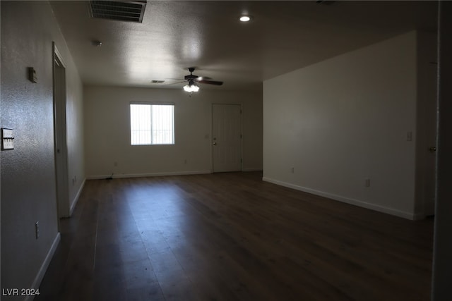 unfurnished room featuring ceiling fan and hardwood / wood-style floors