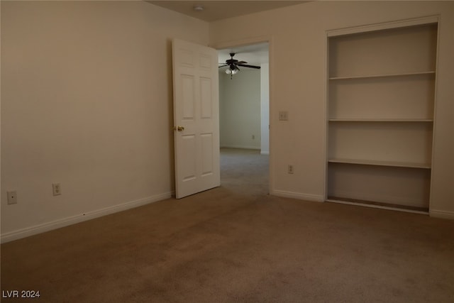 unfurnished bedroom featuring a closet and carpet flooring