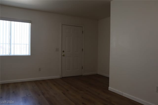 spare room featuring hardwood / wood-style flooring