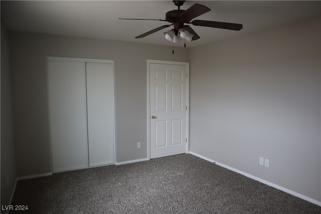 unfurnished bedroom featuring carpet floors and ceiling fan