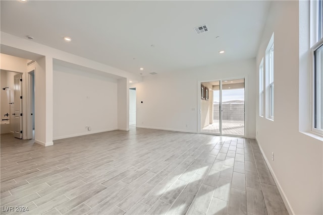 empty room with light wood-type flooring