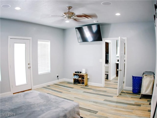 interior space featuring recessed lighting, baseboards, wood finished floors, and a ceiling fan