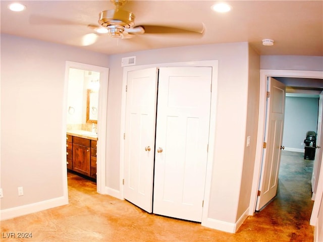 unfurnished bedroom with visible vents, baseboards, recessed lighting, a closet, and a sink