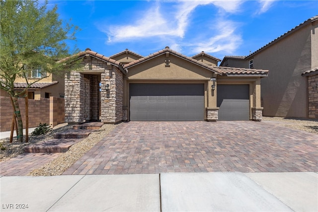 view of front of home featuring a garage