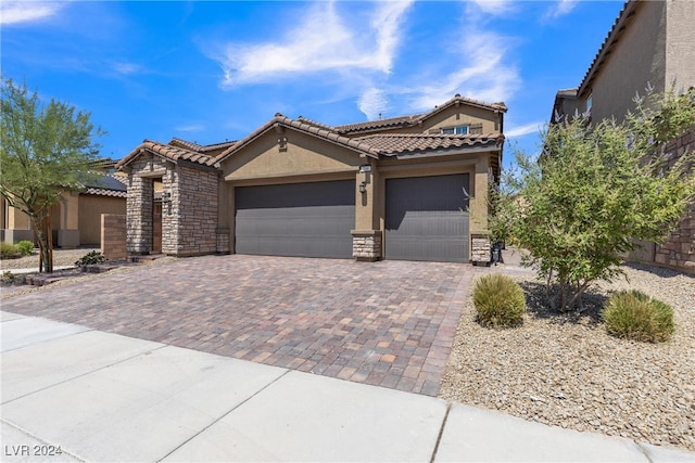 view of front of home with a garage