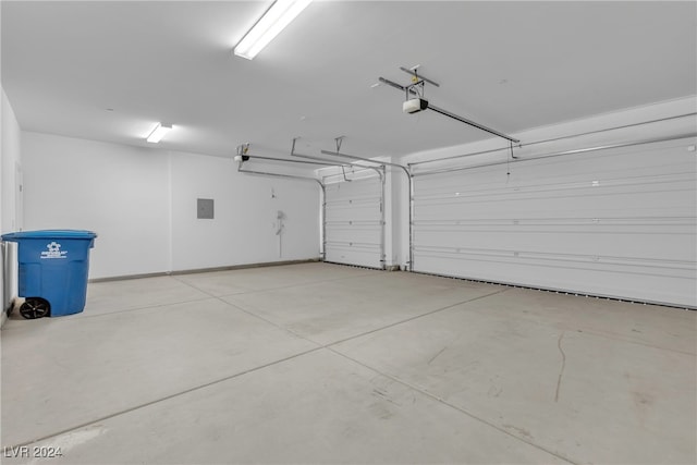 garage featuring a garage door opener