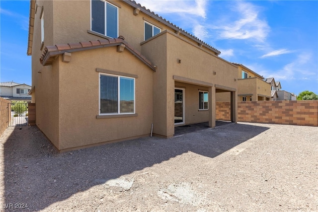 rear view of property with a patio