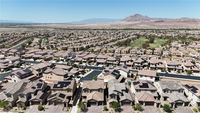 drone / aerial view featuring a mountain view