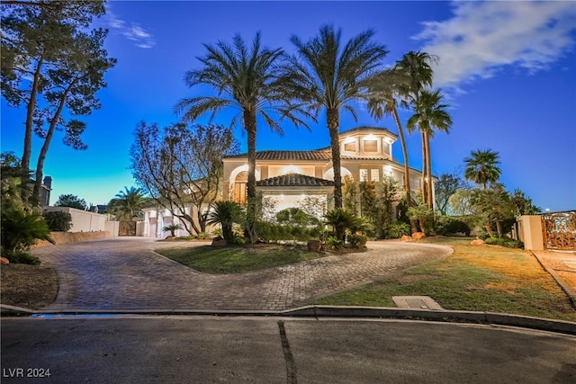 2349 Villandry Ct, Henderson, NV 89074 - view of front of house featuring decorative driveway, stucco siding, a gate, and a tile roof