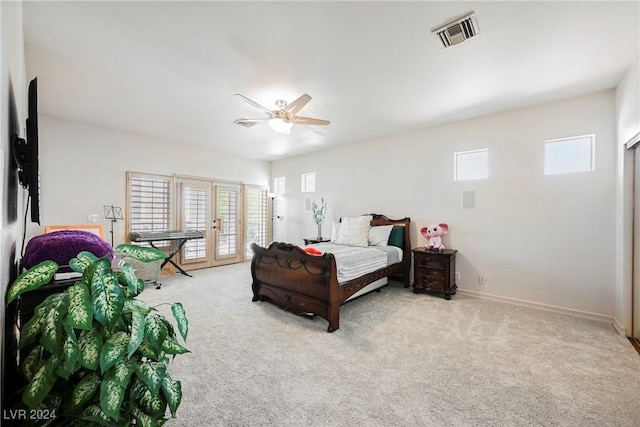 carpeted bedroom with french doors, visible vents, ceiling fan, access to outside, and baseboards