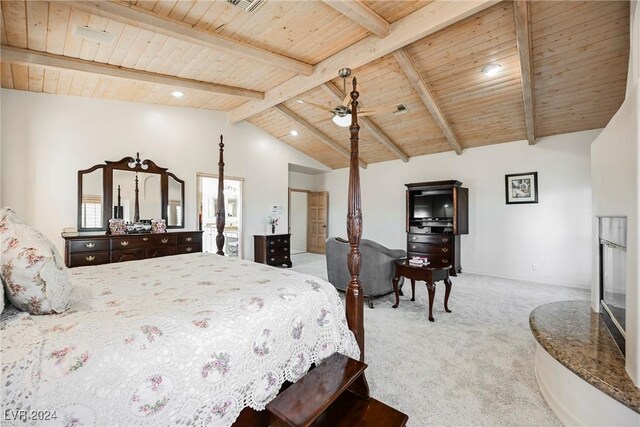 bedroom featuring beamed ceiling, wood ceiling, high vaulted ceiling, light colored carpet, and ceiling fan