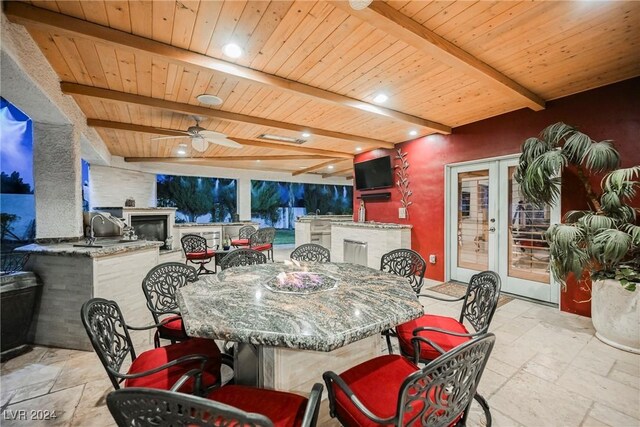 view of patio with french doors, an outdoor kitchen, and ceiling fan