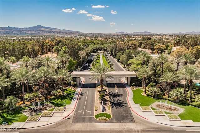 birds eye view of property with a mountain view