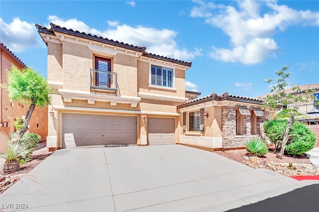 mediterranean / spanish-style house featuring a garage