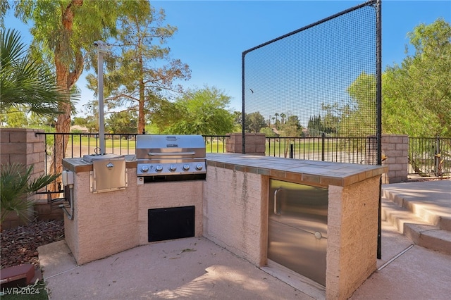 view of patio with area for grilling