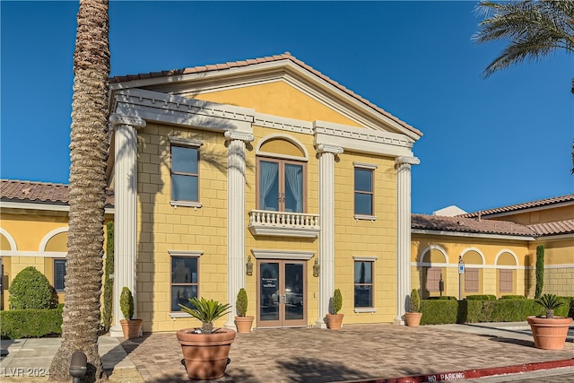 rear view of house with french doors