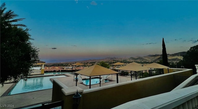 balcony featuring a mountain view