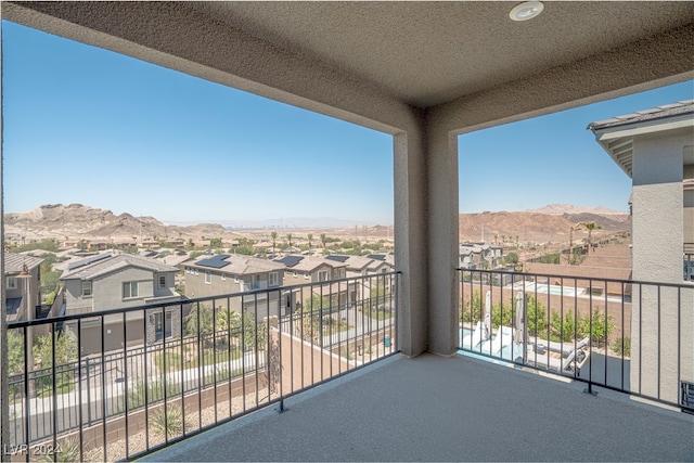 balcony featuring a mountain view